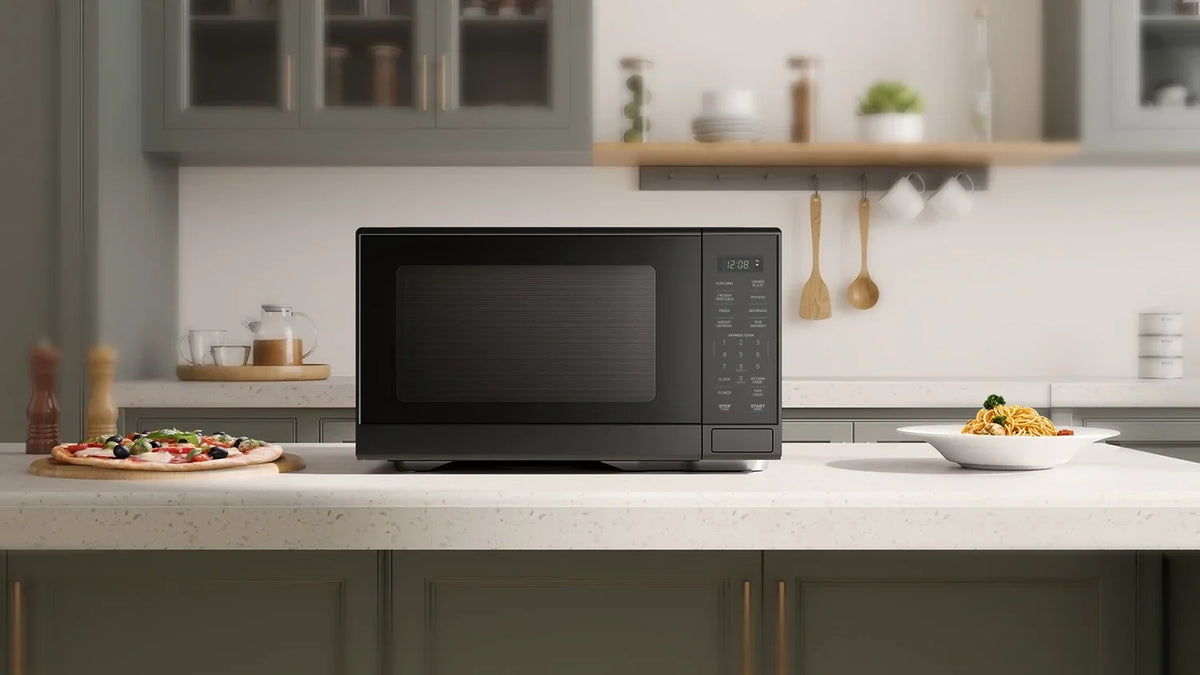 2026 NewMainstays 1.1 cu ft Microwave Oven in black