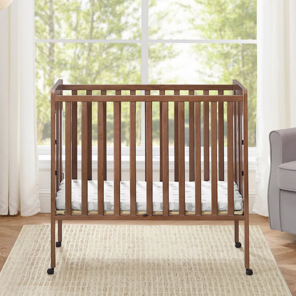 2026 NewDelta Children Lee Portable Folding Mini Crib with 1.5-Inch Mattress - Greenguard Gold Certified, Bianca White