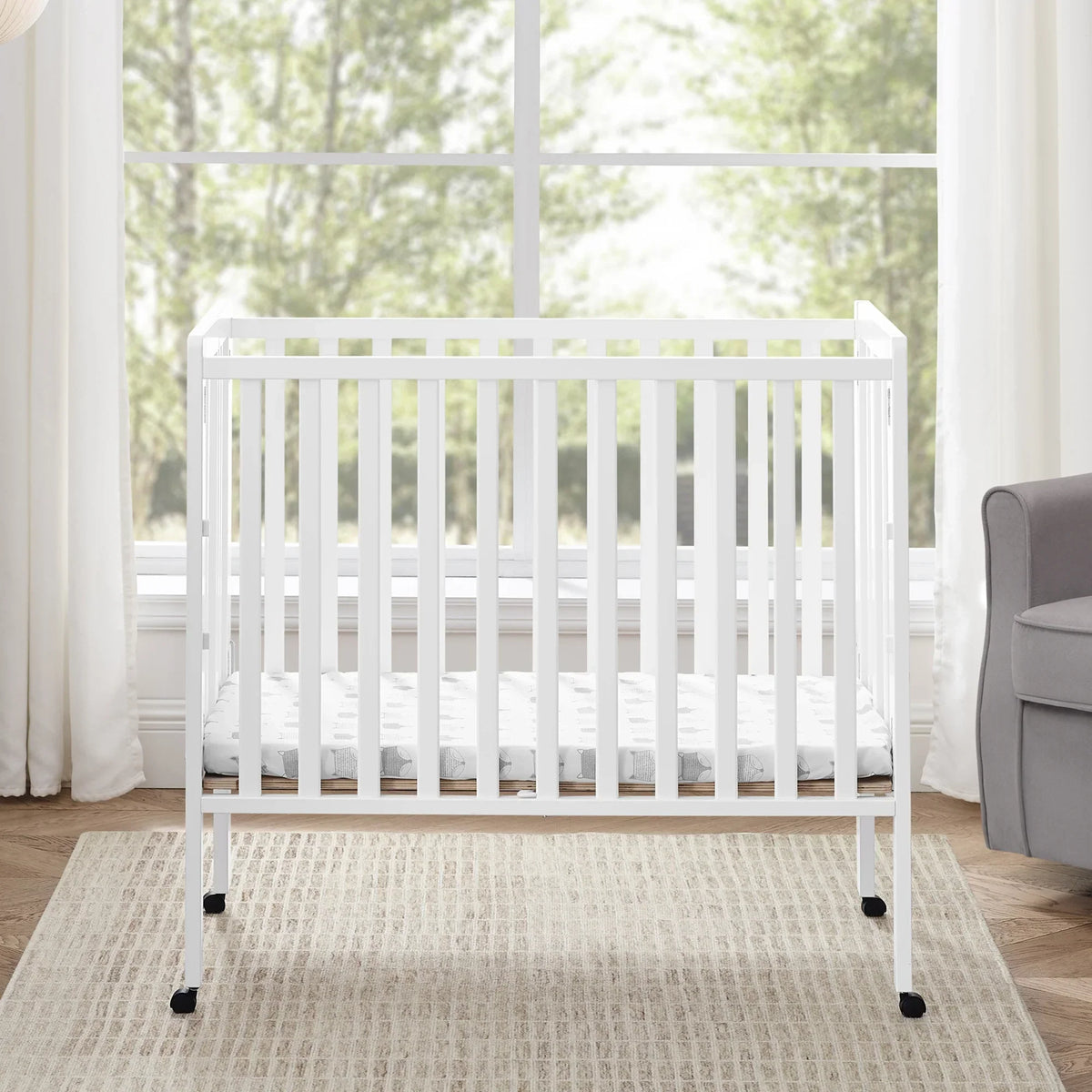 2026 NewDelta Children Lee Portable Folding Mini Crib with 1.5-Inch Mattress - Greenguard Gold Certified, Bianca White