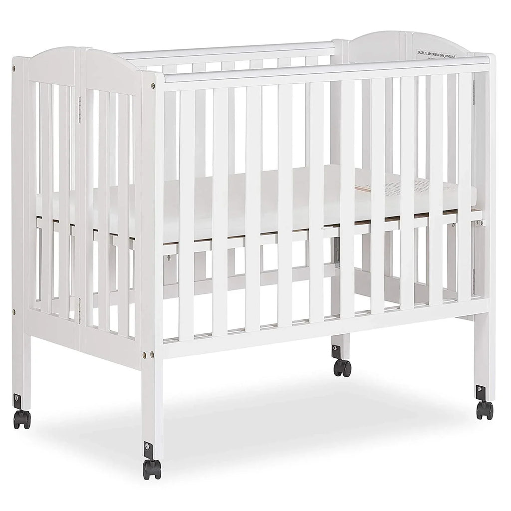2026 NewDream On Me 2-in-1 Folding Portable Mini Crib in White. Mattress Pad Included. Easy to Fold and Store Baby Crib. Two Adjustable Mattress Height positions Convertible Crib